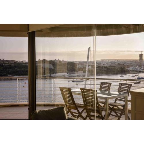 Seafront condo with a view of Valletta