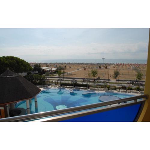 Seaside bliss flat with view on the pool