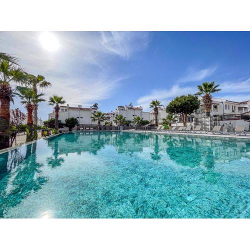 Semi Detached Villa in Complex with Shared Semi Olympic Swimming Pool in Kusadasi