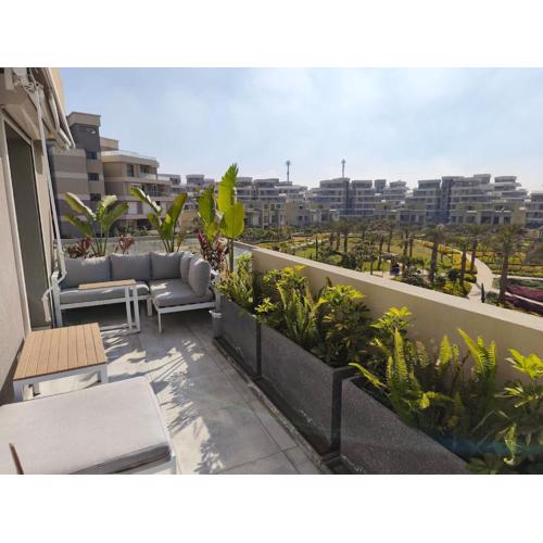 Signature 2BR with Stunning Greenery in Villette SODIC