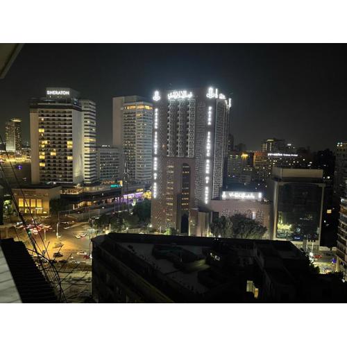 Skyscraper apartment with Nile & Pyramids view
