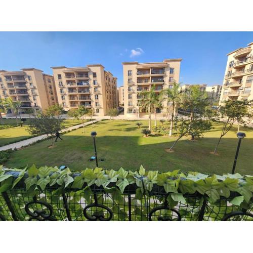 Spacious Modern Apartment with Wide Garden View in Al Rehab 2