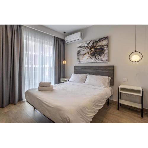 Studio 33 with a double bed & kitchenette at the new Olo living