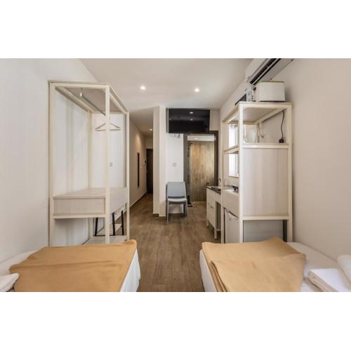 Studio 44 with twin beds & kitchenette at the new Olo living