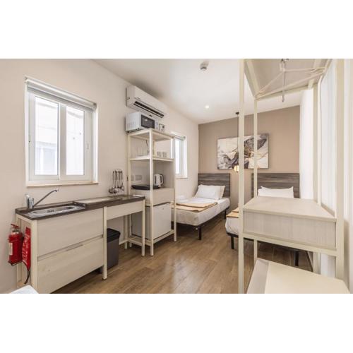 Studio apartment with twin beds & kitchenette at the new Olo living 24