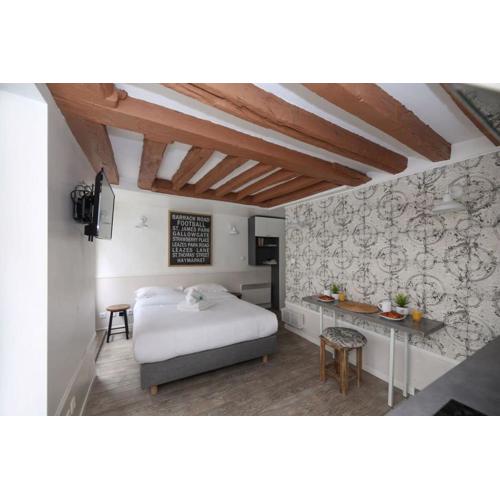 Studio parisien 20m2 en face du musee Grevin - 2P