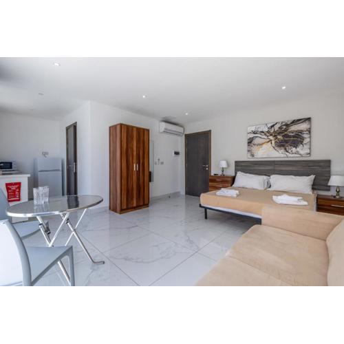 Studio Penthouse 51 with side sea views at the OLO Living guesthouse