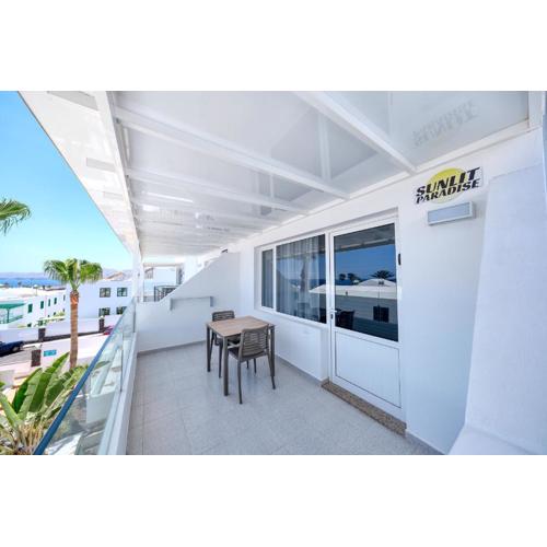 Sunlit Paradise - sea view