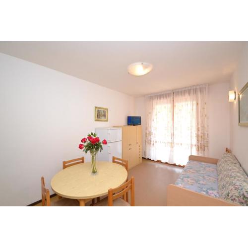 Sunny apartment right by the beach