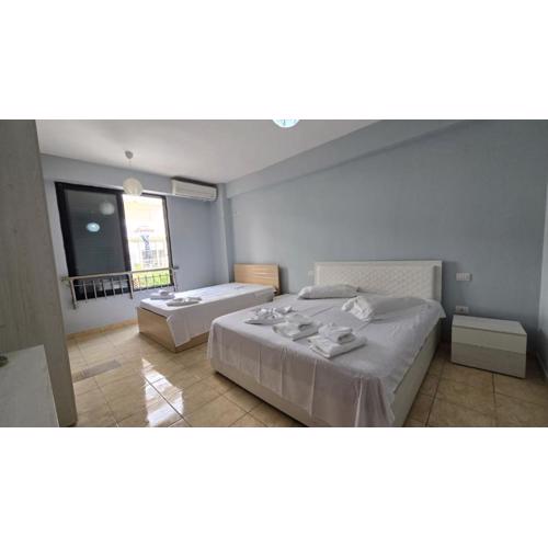 Tirent Apartment - Cozy Bedrooms Stay by Golem Beach