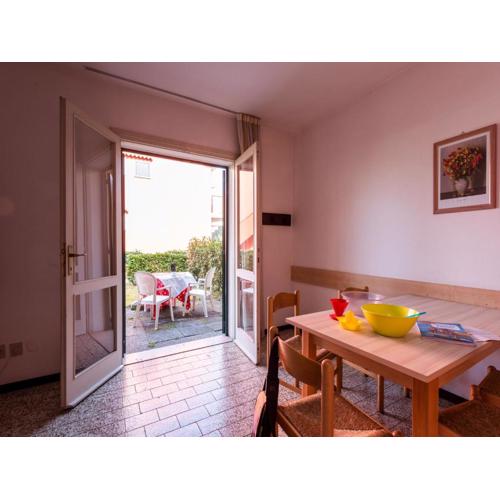 Townhouse with garden and pool in Bibione