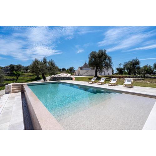 Trulli Cicerali , trulli design con piscina panoramica