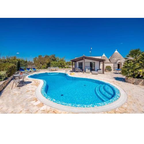 Trullo Olivia con piscina riscaldata, natura e relax