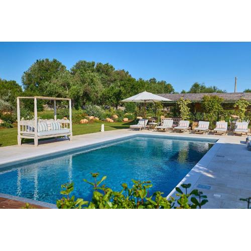 Trullo Sessana with large pool and gorgeous Al Fresco dining areas