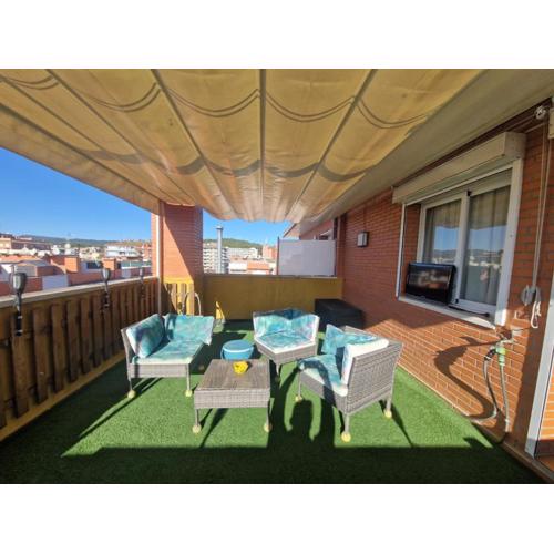 Un ático duplex con terraza grande al lado del mar