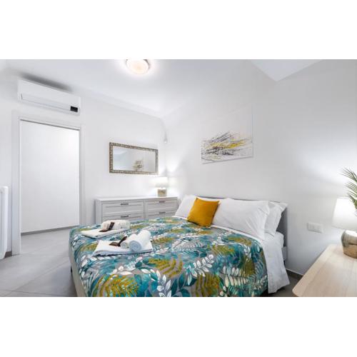 V-Home nel Centro del Quadrilatero con 2 Camere da Letto