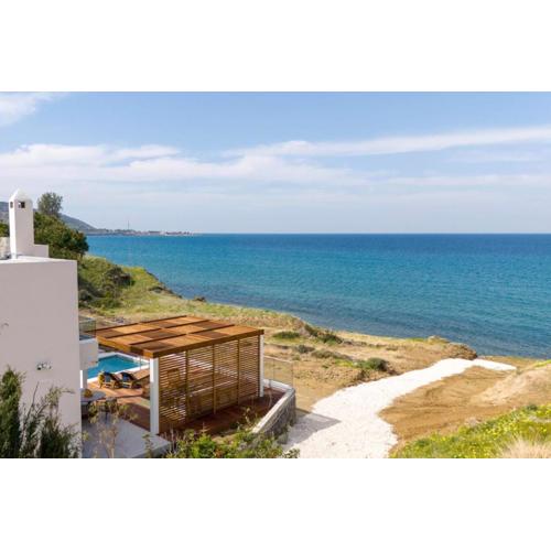 Villa Akroyiali - Seafront Serenity with Shared Pool