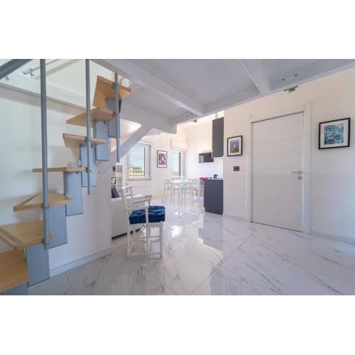 Vista Mare: Moderno Loft al Centro di Alghero