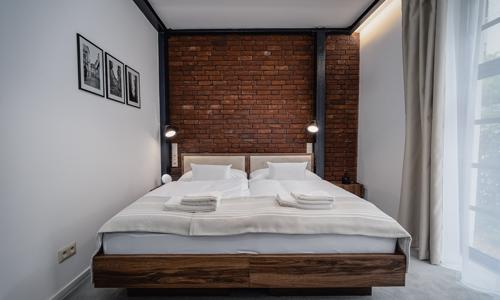Bratislava blízko centra: Moderní čtvrť Nové Nivy ve stylovém Garni Hotelu DOCK se snídaněmi formou bufetu