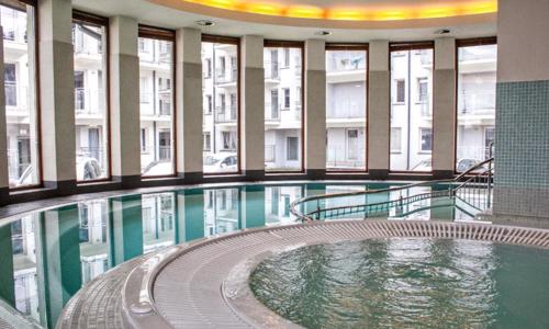 Horská dovolená v Zakopaném blízko termálů a atrakcí v Prestige Apartment + bazén, vířivka a sauna neomezeně