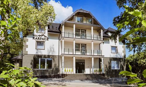 Polské Krkonoše ve Ville Karpacz s polopenzí a vstupenkou do aquaparku + sleva na výlety a láhev vína