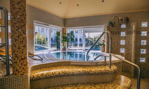 Zalakaros u lázní v Aqua Therm Hotelu *** s neomezeným wellness, snídaněmi, zapůjčením kol a slevami + hřiště